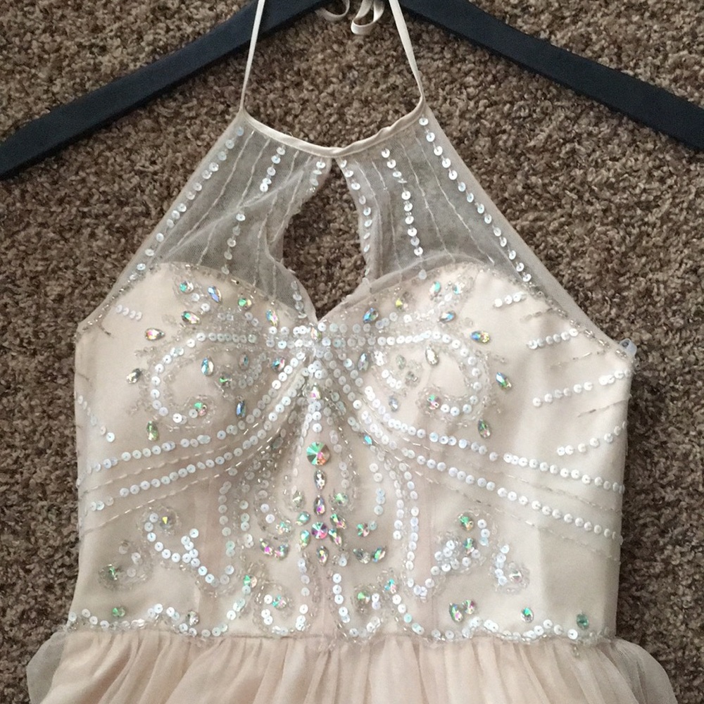 Beautiful dress by Masquerade